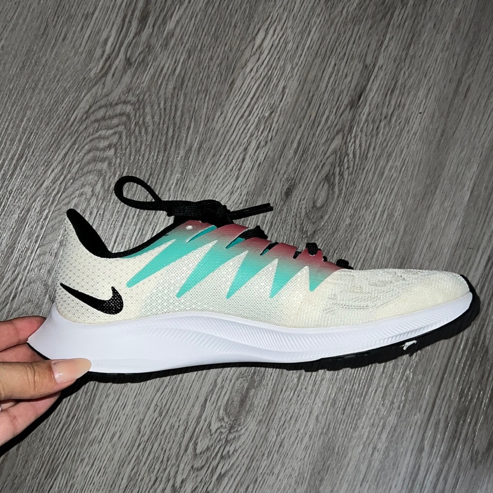 PRACTICALLY BRAND NEW NIKE SHOES. USED ONCE FOR LESS THAN 2 HOURS INDOOR